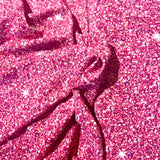 Tissu maillot de bain, motif rose à paillettes