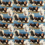 Tissu jersey chevaux fond bleu