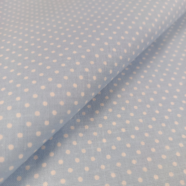 Tissu petits poids blancs