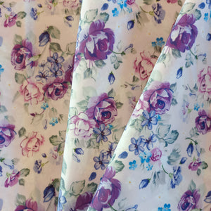 Toile imperméable roses violettes