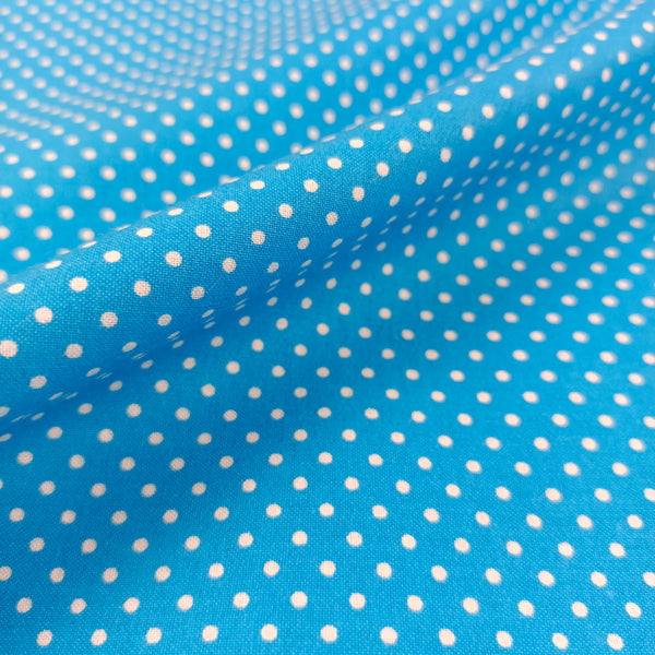 Tissu petits poids blancs