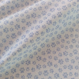 Popeline coton patte d’ours bleu ciel