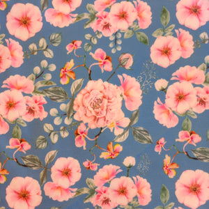 Toile imperméable roses sur fond bleu