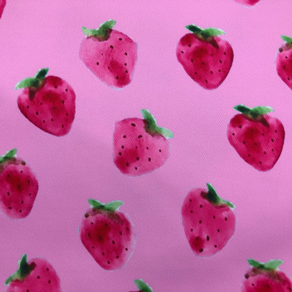 Tissu déperlant fraises sur fond rose