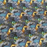 Tissu jersey motif dinosaure