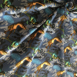 Tissu jersey motif dinosaure